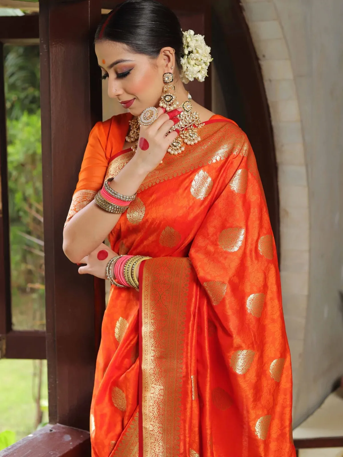 An insanely Orange Soft Silk Saree With Ephemeral Blouse Piece
