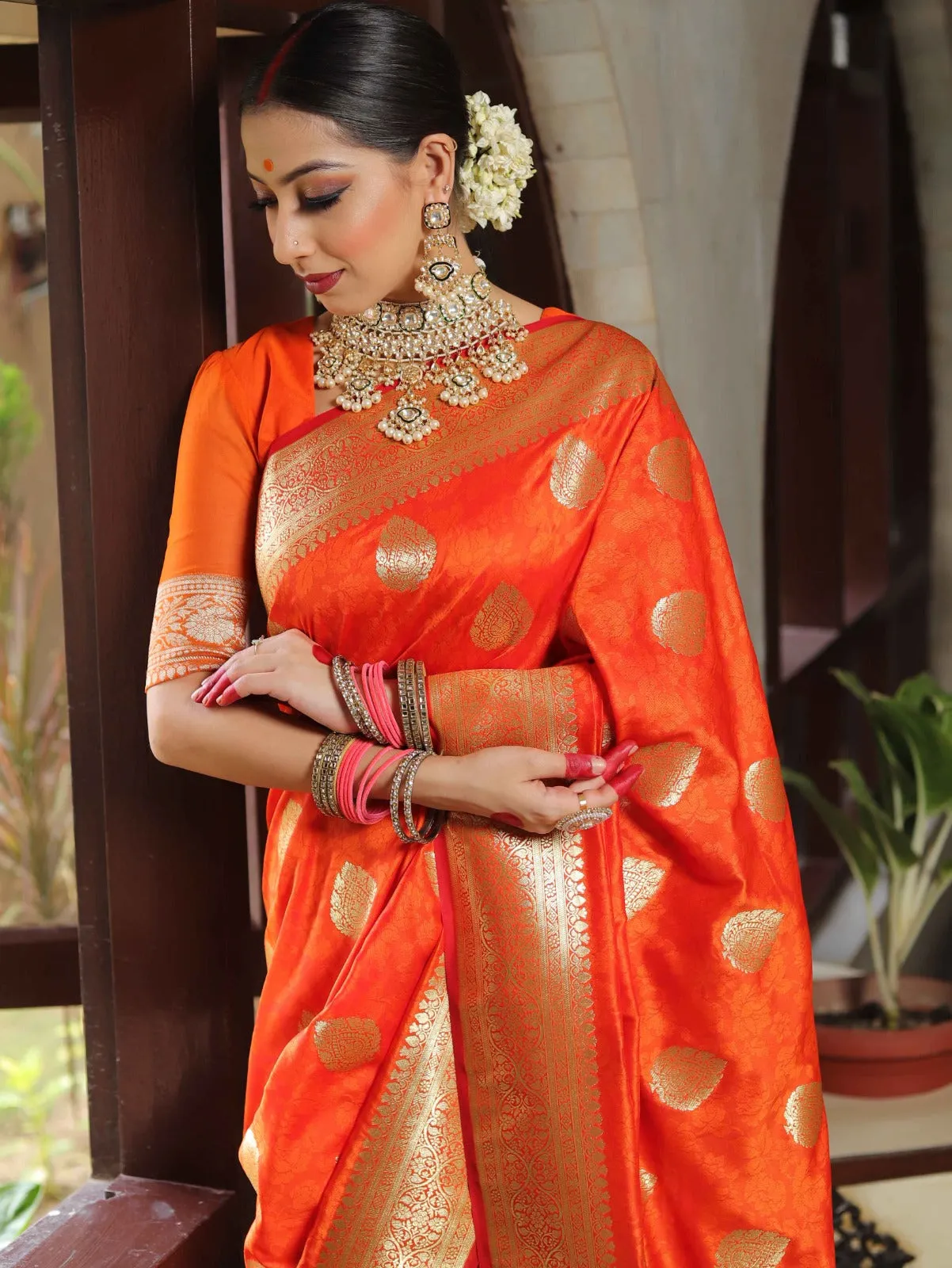 An insanely Orange Soft Silk Saree With Ephemeral Blouse Piece