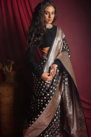 Entrancing Black Soft Silk Saree With Glowing Blouse Piece