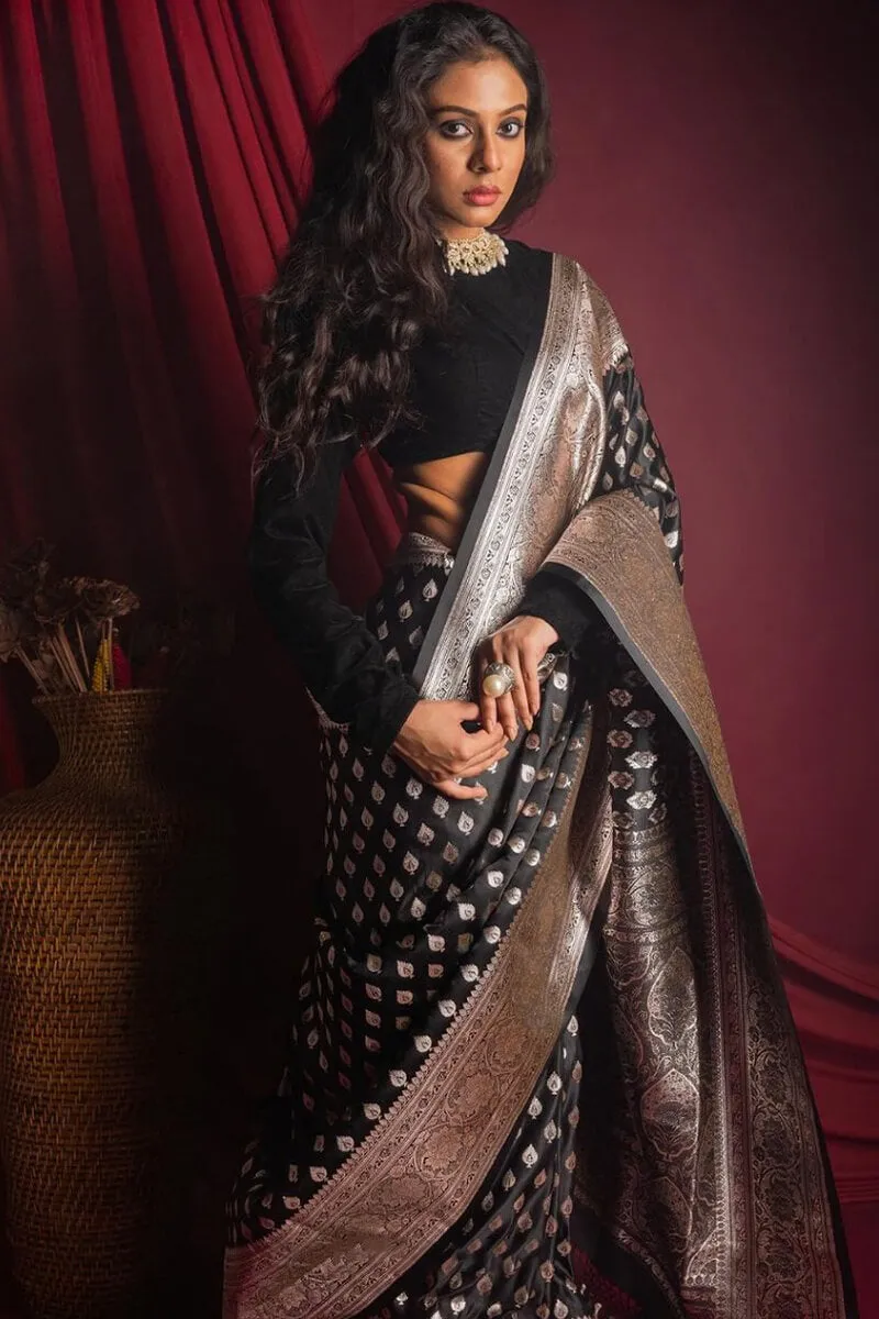 Entrancing Black Soft Silk Saree With Glowing Blouse Piece