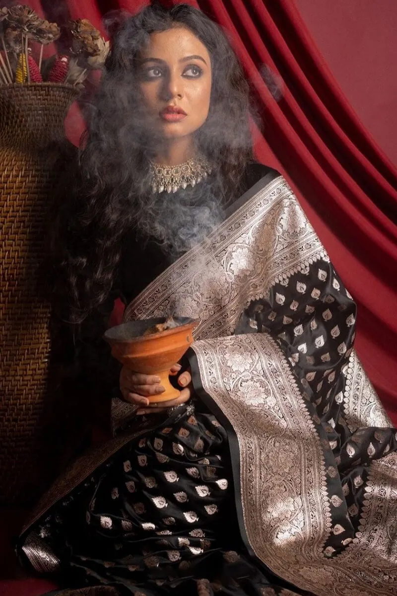 Entrancing Black Soft Silk Saree With Glowing Blouse Piece